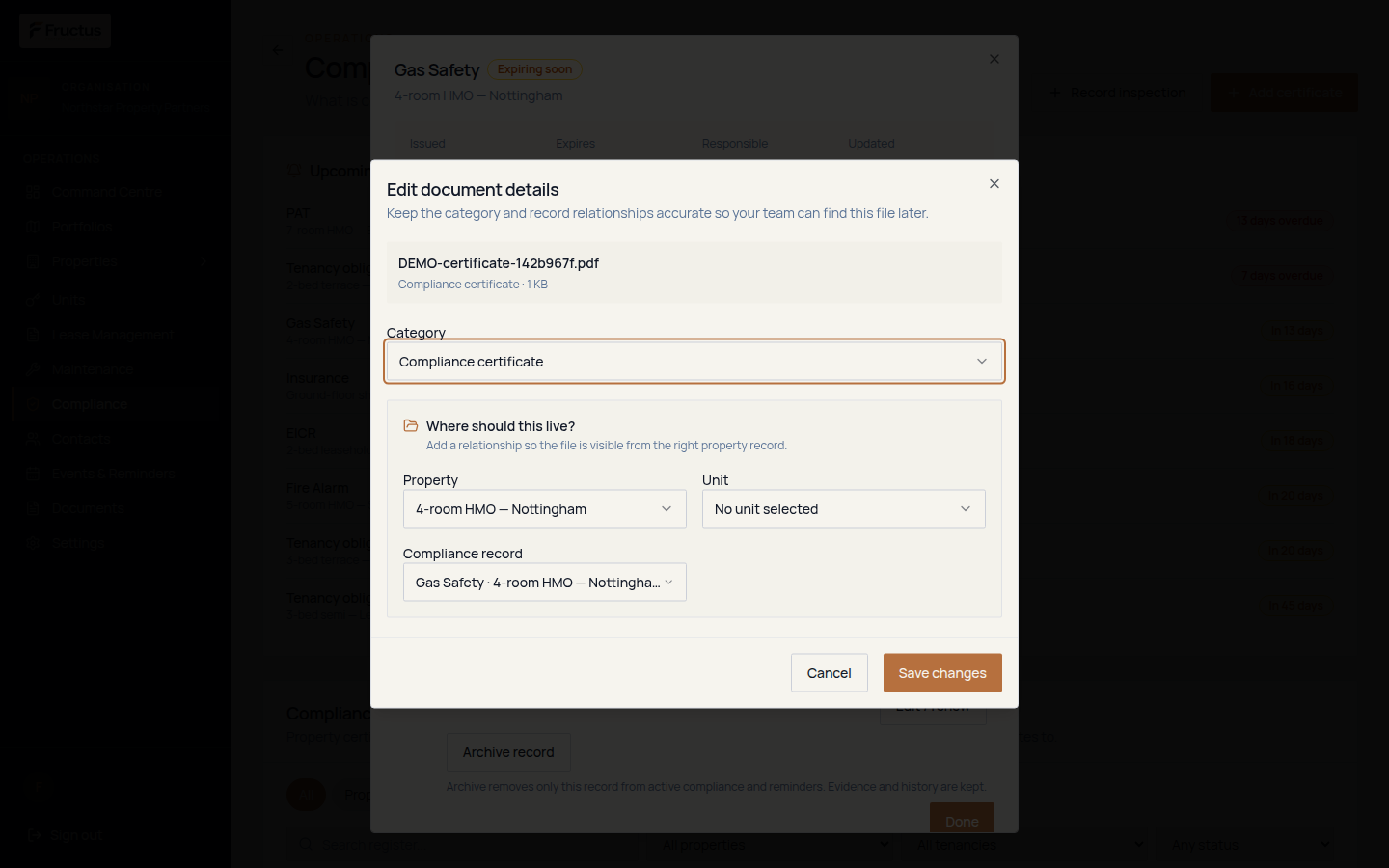 Edit document details dialog for a fictional demonstration certificate PDF, showing Category and the Where should this live section with Property, Unit and Compliance record selectors