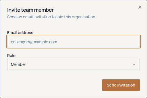 Fructus team invitation form, not submitted, with an email field containing example placeholder text and a membership role selector